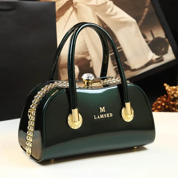 2024 New Fashionable Genuine Leather Women's Bag, Middle aged Mom's Bag, Versatile, Large Capacity, and Atmospheric Clip Handbag